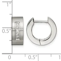 Stainless steel huggie earrings with a brushed finish and a vertical channel of five round cubic zirconia stones, shown with a measurement scale indicating approximately 0.5 inch width and 1 inch height.