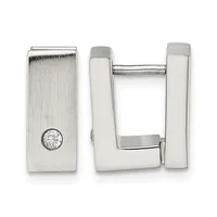 A pair of polished silver rectangular hoop earrings with a small diamond accent on one post, displayed against a white background.