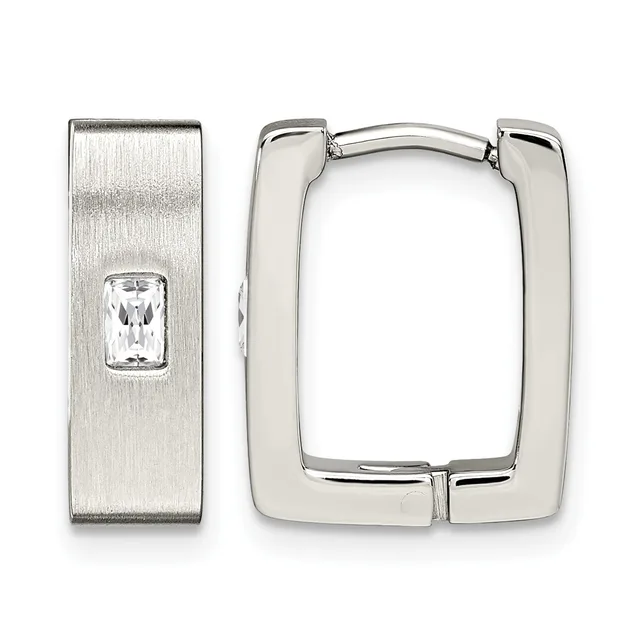 A pair of silver hoop earrings: one rectangular huggie-style hoop and one rectangular post earring with a brushed finish and a small rectangular crystal stone.