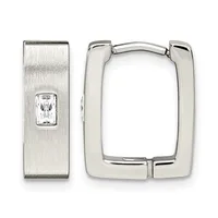 A pair of silver hoop earrings: one rectangular huggie-style hoop and one rectangular post earring with a brushed finish and a small rectangular crystal stone.