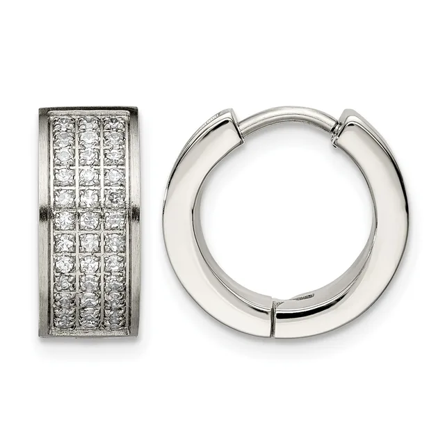Two silver-toned metal earrings: on the left, a rectangular huggie with pave-set round diamonds in a grid pattern; on the right, a polished chunky hoop with a hinged closure.