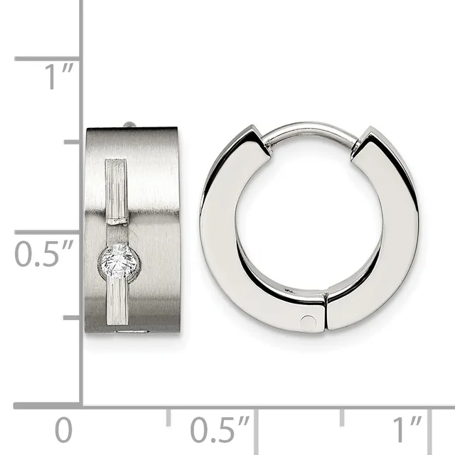 Two silver earrings displayed against a ruler: a rectangular hinged huggie with a center diamond, and a polished chunky hoop, each approximately 0.5 inches wide.