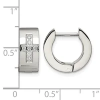 A pair of polished silver hinged hoop earrings with a cross design set with diamonds on the front, displayed next to a measurement scale.