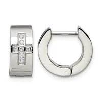Pair of silver hoop earrings, one showing a cross design set with diamonds on the front face, the other a polished curved hoop viewed from the side.