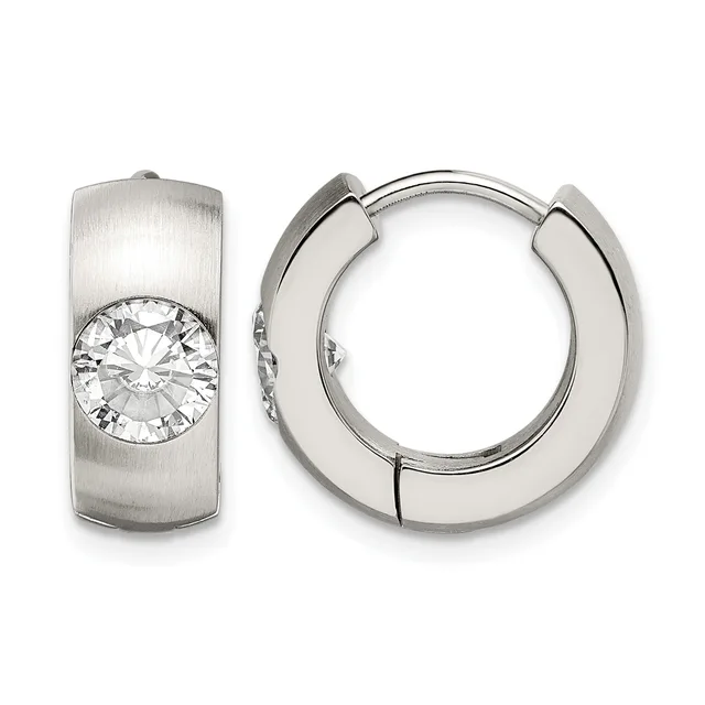 A pair of silver huggie hoop earrings with brushed finish and round brilliant-cut cubic zirconia stones set in the front.