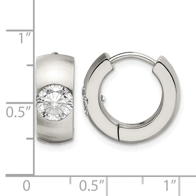 Pair of silver huggie hoop earrings with a brushed finish and round cubic zirconia stone, shown with a ruler indicating approximately one inch in length.