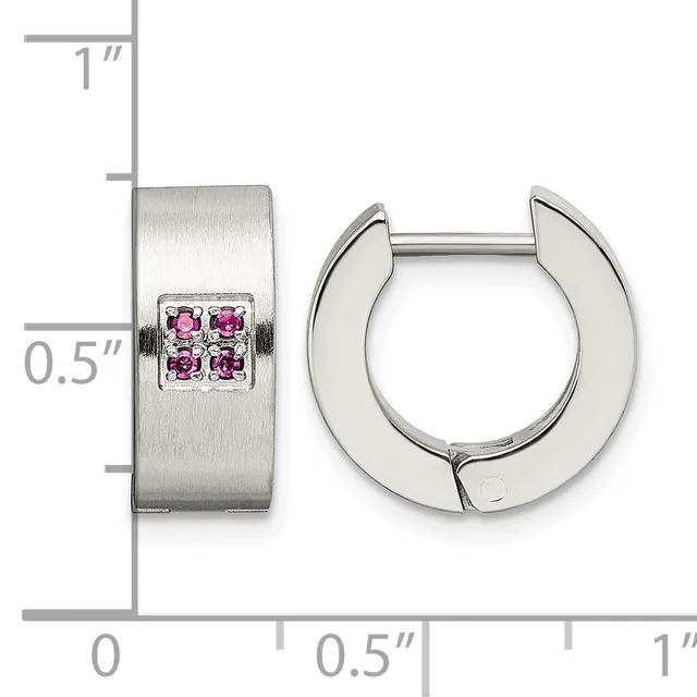 Pair of silver huggie earrings with brushed finish and small square settings containing four pink gemstones, shown with measurement scale.