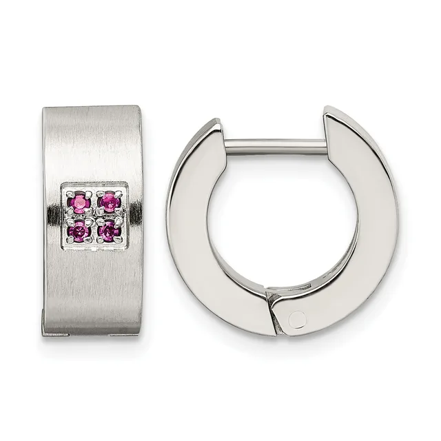 Pair of silver huggie hoop earrings with a brushed finish and four small pink gemstones set in a square pattern on the front surface.