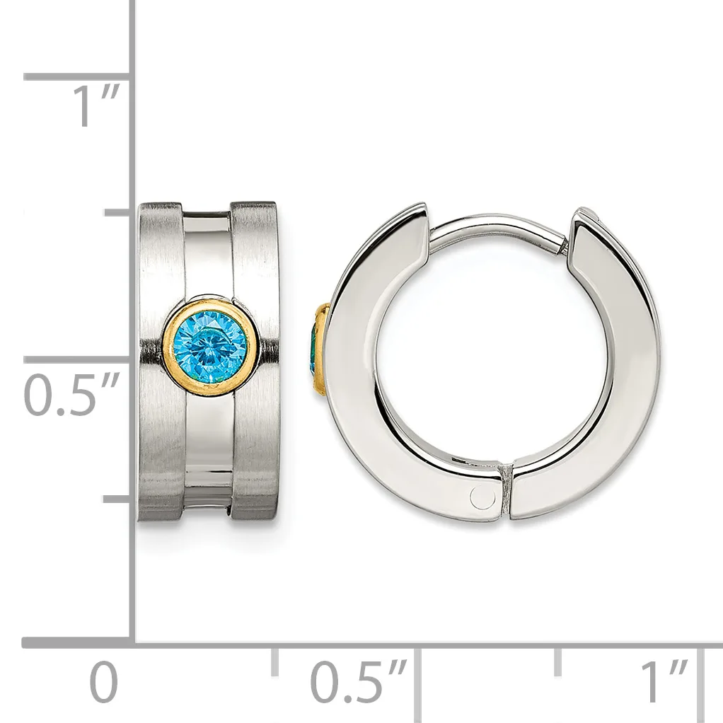 Two stainless steel hoop earrings with blue gemstone accents and gold-tone bezels, shown front and side view with measurement scale.