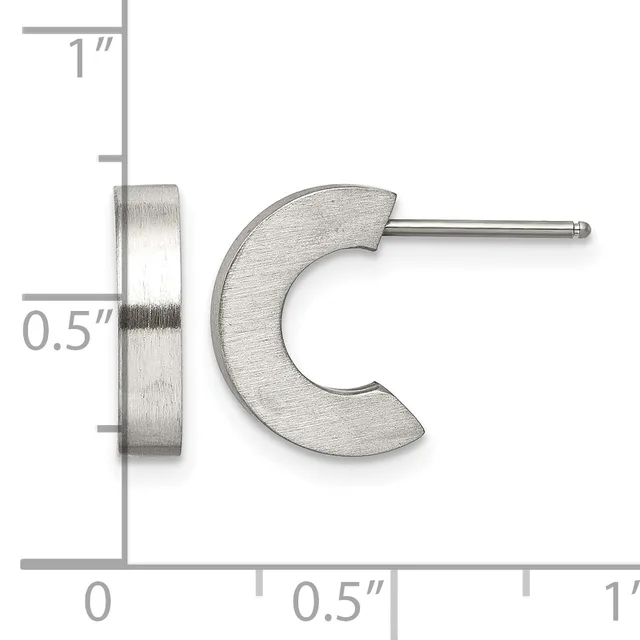A pair of silver-toned curved crescent earrings with posts and backs, displayed next to a ruler showing measurements of approximately 0.5 inches wide and 1 inch tall.