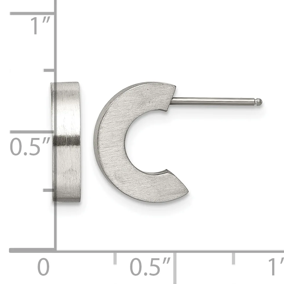 A pair of silver-toned curved crescent earrings with posts and backs, displayed next to a ruler showing measurements of approximately 0.5 inches wide and 1 inch tall.