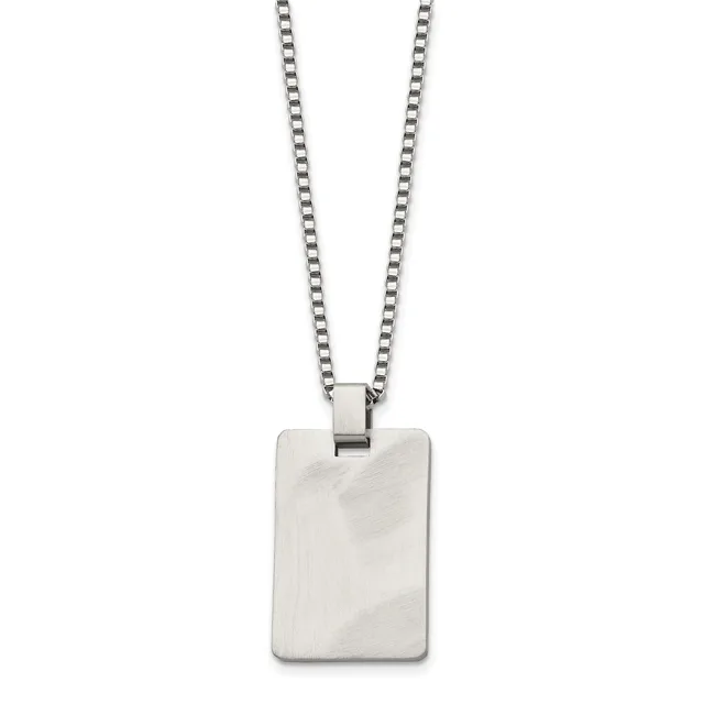A polished stainless steel rectangular pendant with a textured surface hangs from a matching box chain necklace.