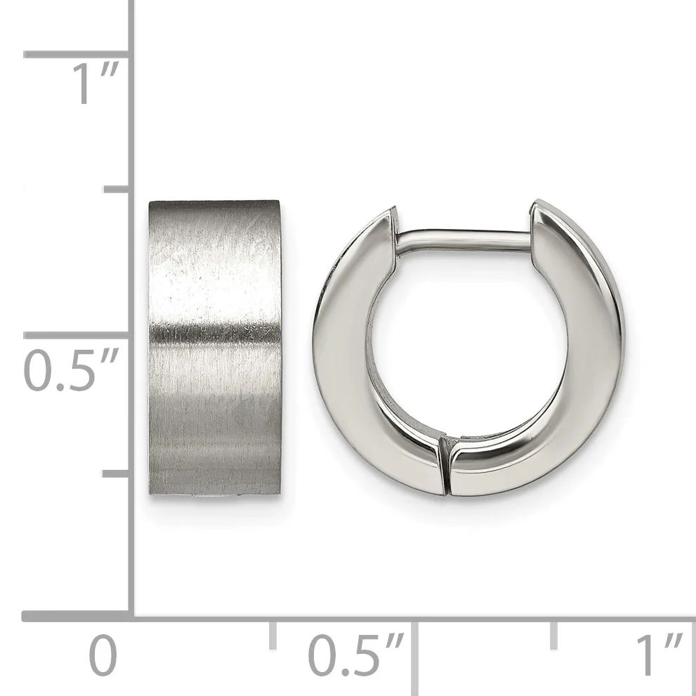 Two polished silver-toned chunky hoop earrings displayed next to a ruler showing approximately half-inch width and one-inch height.