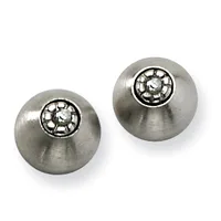 Two brushed silver spherical earrings with small circular wheel-patterned studs on top.