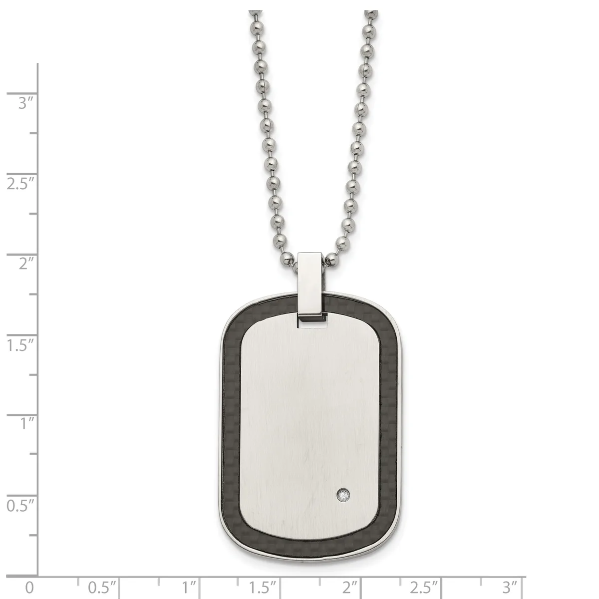 A stainless steel dog tag pendant with rounded corners and a small diamond accent, suspended from a beaded chain, shown against a measurement scale.