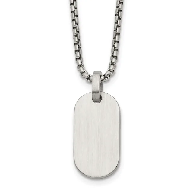 A brushed stainless steel dog tag pendant hangs from a matching stainless steel box chain necklace against a white background.