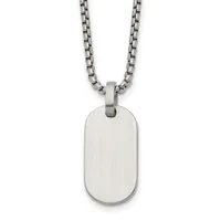 A brushed stainless steel dog tag pendant hangs from a matching stainless steel box chain necklace against a white background.