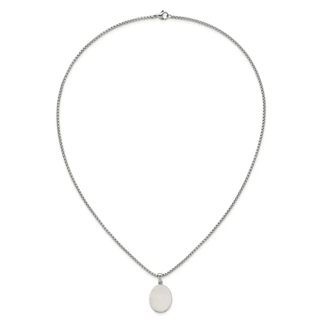 Silver chain necklace with a small oval pendant hanging from the center.