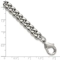 Silver-toned curb chain bracelet with a lobster clasp, shown against a ruler measuring approximately 2 inches in width.