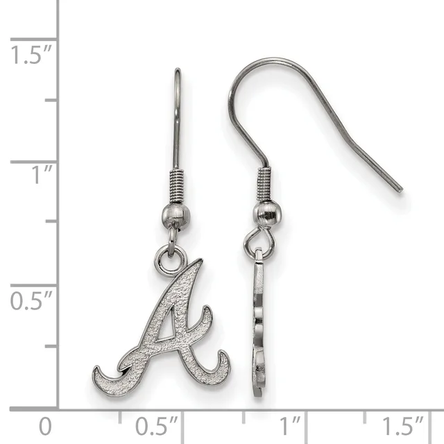 A pair of silver-toned earrings with hook wires, featuring an ornate letter A charm on one earring and a plain rectangular bar on the other, displayed against a measurement ruler.