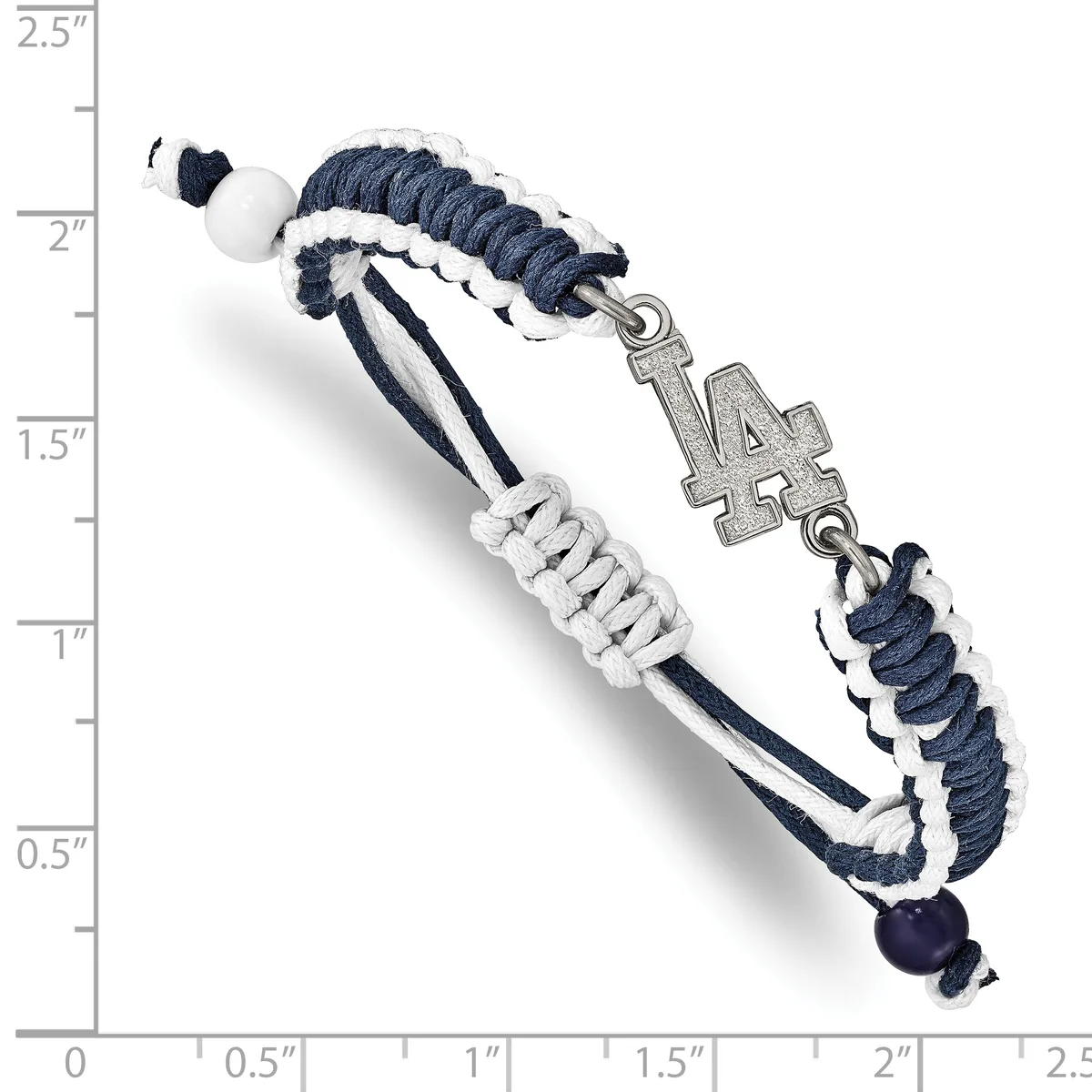Navy blue and white braided cord bracelet with a silver cross charm and beaded accents, displayed against a ruler showing approximately 2.25 inches in length.
