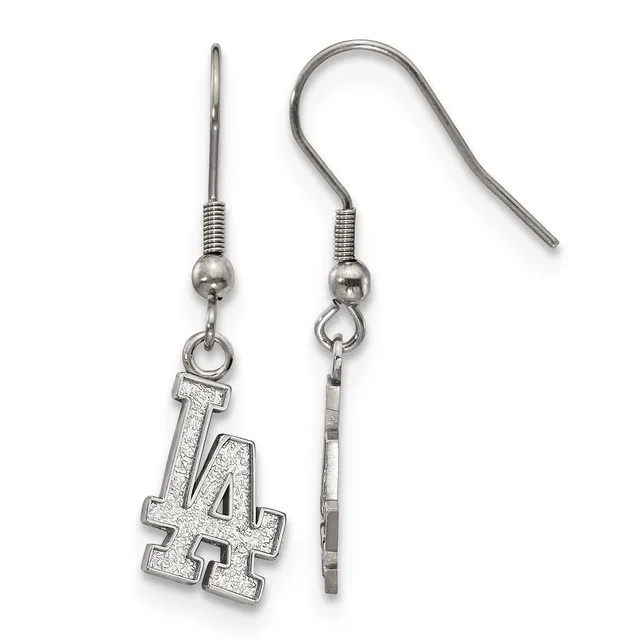 A pair of silver-toned earrings with hook wires, one featuring an LA charm with glittery finish and the other showing the back of the charm.