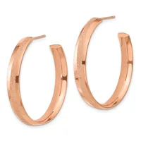 Two pairs of rose gold hoop earrings with textured and polished finishes, displayed side by side.