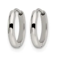 A pair of polished silver hoop earrings with a chunky, rounded profile and hinged closures, shown from the front.