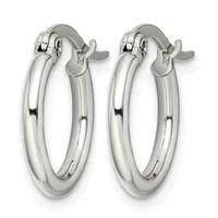 A pair of polished silver-toned hoop earrings with thick tubular bodies and hinged clasp closures, shown from the front.
