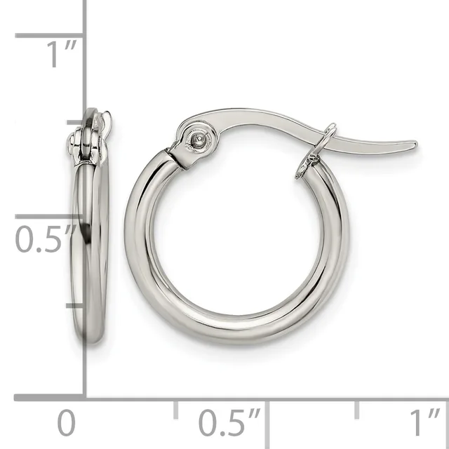 A pair of polished silver-toned hoop earrings with hinged closures, displayed front and side view with measurement scale showing approximately one inch diameter and half inch thickness.