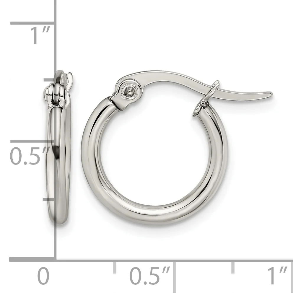 A pair of polished silver-toned hoop earrings with hinged closures, displayed front and side view with measurement scale showing approximately one inch diameter and half inch thickness.