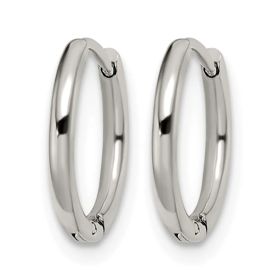 A pair of polished silver-toned hoop earrings with a smooth, rounded profile and hinged closures, displayed side by side against a white background.