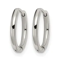 A pair of polished silver-toned hoop earrings with a smooth, rounded profile and hinged closures, displayed side by side against a white background.