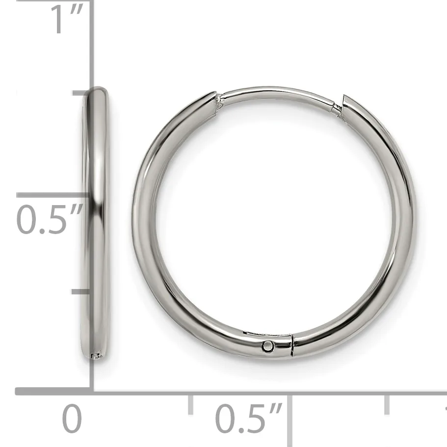 Silver-toned hinged hoop earrings shown from front and side view with measurement scale indicating approximately one inch in diameter and half inch in thickness.