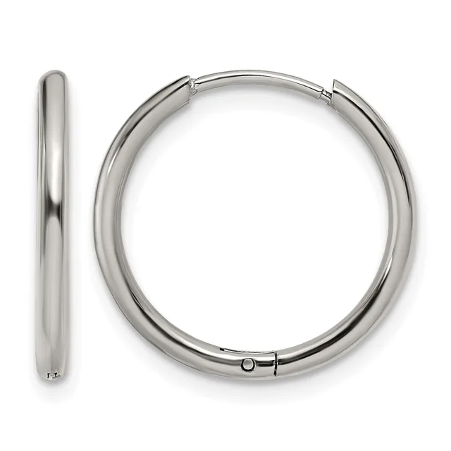 A pair of polished silver-toned hoop earrings with a thick, rounded profile and hinged closures, shown from front and side views.
