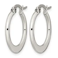 A pair of polished silver-toned oval hoop earrings with a flat, smooth surface and hinged closure posts, shown from the front.