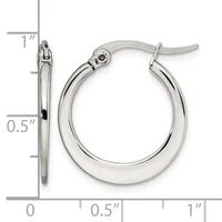 A pair of polished silver-toned hoop earrings with hinged closures, shown next to a ruler indicating they measure approximately one inch in diameter.