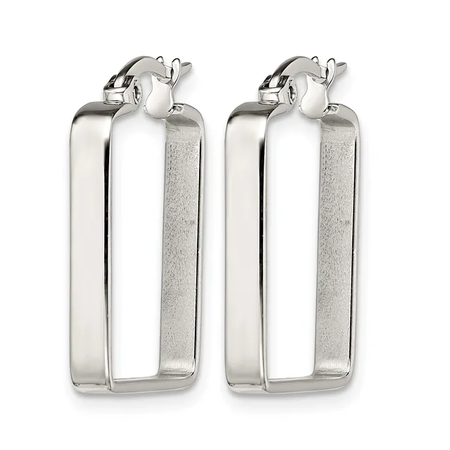 A pair of polished silver rectangular tube hoop earrings with textured sides and hinged closures, shown from the front.
