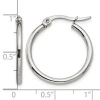 A pair of polished silver-toned hoop earrings with a measurement scale showing they are approximately one inch in diameter.