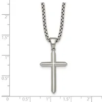 A stainless steel cross pendant on a box chain necklace, displayed against a measurement ruler showing the pendant is approximately one inch wide and one inch tall.