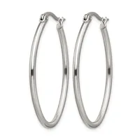 A pair of polished silver-toned oval hoop earrings with hinged posts, displayed against a white background.