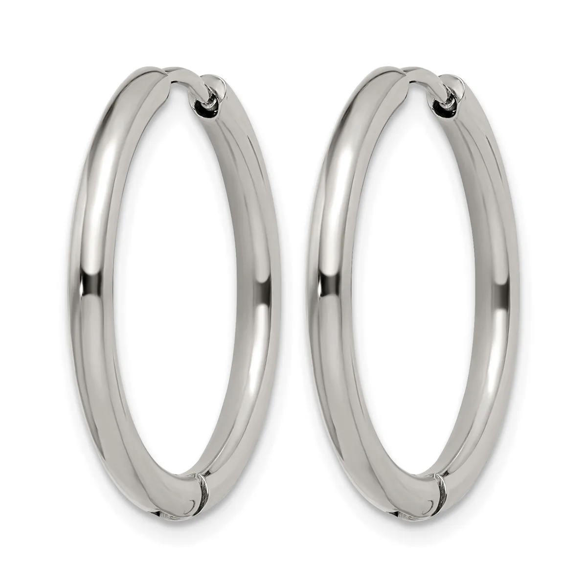 A pair of polished silver hoop earrings with a chunky tubular design and hinged closures, shown against a white background.