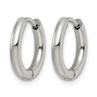 A pair of polished silver-toned chunky hoop earrings with hinged closures, displayed against a white background.
