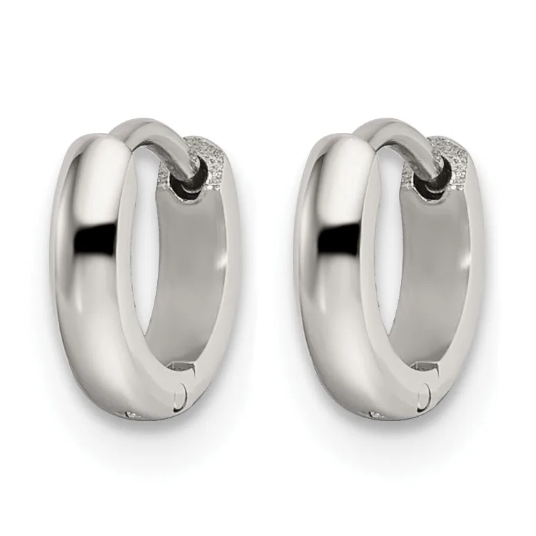 A pair of polished silver chunky hoop earrings with a hinged clasp closure shown from the front against a white background.