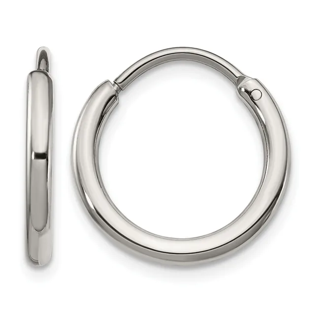 A pair of polished silver-toned hoop earrings shown from the front and side view, featuring a chunky tubular design with a hinged closure.