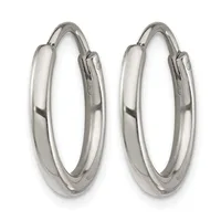 A pair of polished silver-toned hoop earrings with hinged closures, displayed side by side against a white background.