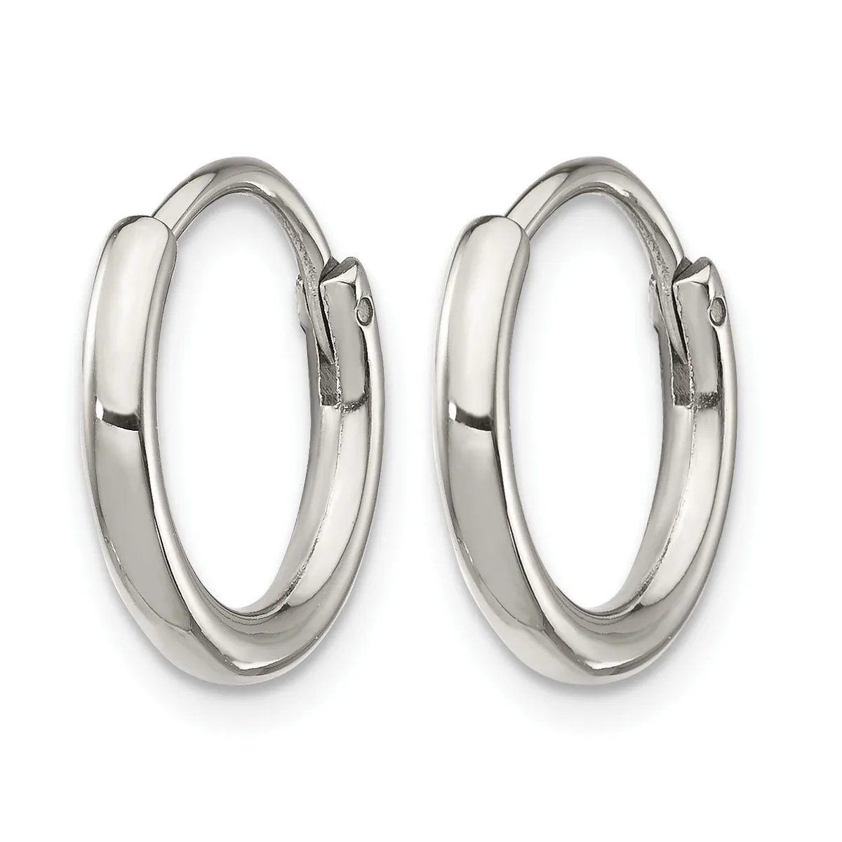 A pair of polished silver-toned hoop earrings with a chunky, rounded profile and hinged closures, displayed against a white background.