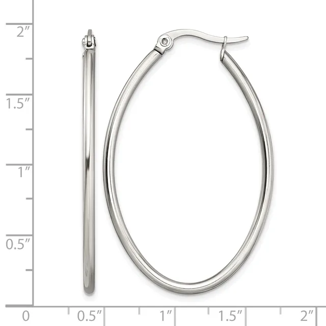 Pair of polished silver-tone oval hoop earrings with hinged posts, shown next to a ruler measuring approximately two inches in length.