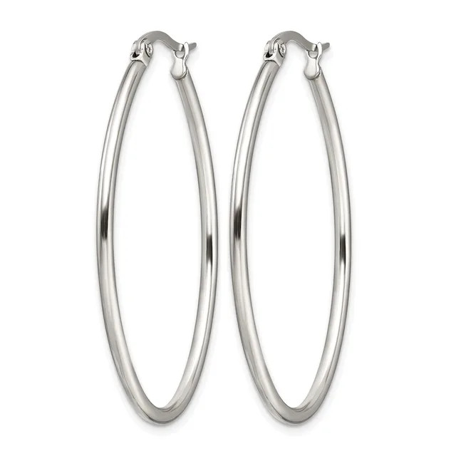 A pair of polished silver-toned oval hoop earrings with hinged posts, shown against a white background.