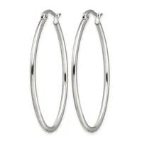 A pair of polished silver-toned oval hoop earrings with hinged posts, shown against a white background.